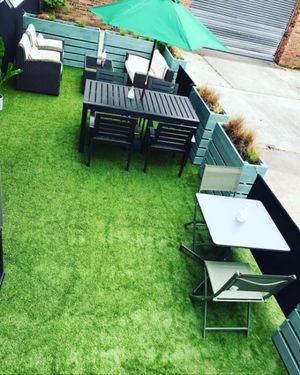 Outdoor seating at Grounded in the North in Manchester