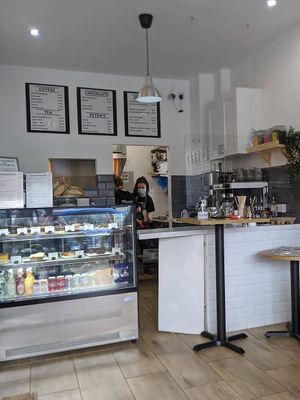 Inside (Older photo, during pandemic - tables and slight revamp since taking) at Grounded in the North in Manchester