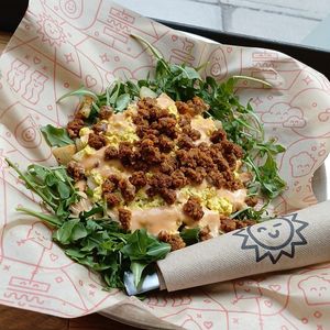 Vegan Breakfast Hash: scrambled tofu, potato, plant-based chorizo, arugula, & chipotle "aioli" at Mildred's in Kansas City