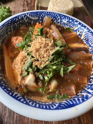 Tom Yum with sheet glass noodles  at Anotai in Bangkok