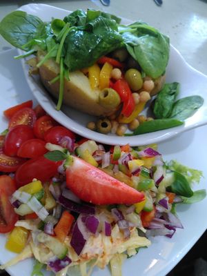 Jacket Potato with olives, spinach, roasted peppers & chickpeas at Two the Square in Conwy