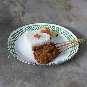 Tricken Satay: served with peanut sauce with your choice of white or red rice at Warung Dua Hati in Canggu