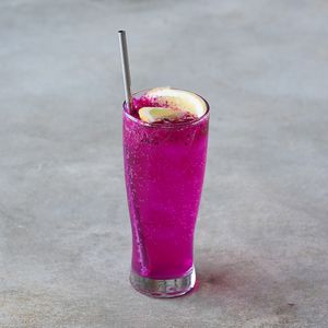 Red Lemon: soda water, dragon fruit, and lemon juice at Warung Dua Hati in Canggu