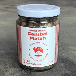 Home-made Sambal Matah 250gr (GF): red cayenne pepper, red chili, shallots, lemongrass, torch ginger, vegan shrimp paste, coconut oil, seasoning at Warung Dua Hati in Canggu