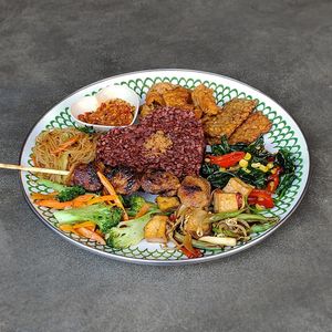Build Your Own Nasi Campur: can’t decide? Pick your favorite rice, vegan proteins, vegan satays, fresh veggies, sides, and sambals to build your wholesome plate at Warung Dua Hati in Canggu