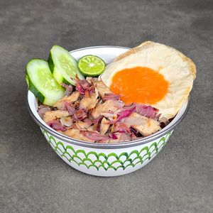 Balinese Matah "Chicken" Bowl with "Egg": pan-seared “chicken” in fragrant sambal matah, shallots, lemongrass, and lime leaves, a sunny side up "egg", key lime, white or red ri at Warung Dua Hati in Canggu