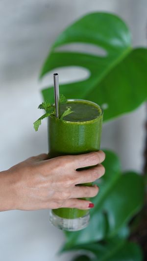 Dua Hati Protein Smoothie (GF): kale, spinach, mango, plant-based protein powder, and coconut water at Warung Dua Hati in Canggu