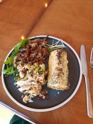 Vegan sausage roll, sesame and soy roasted cauliflower, cabbage and mushrooms, and fennel and pak choi salad at Locavore Grocery & Canteen in Edinburgh