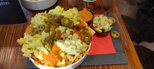 Vegan nachos with jalapenos, salsa and guacamole at The Huggy's Bar - Bruxelles 1 in Brussels