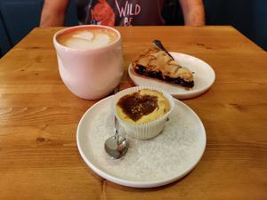 Cherry pie, salted caramel tart, and creamy coffee. Couldn't ask for more! at Coffee Place in Tbilisi