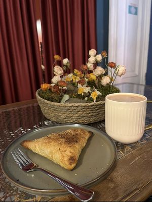 Какао и слойка с булгуром и соевым фаршем  at Coffee Place in Tbilisi