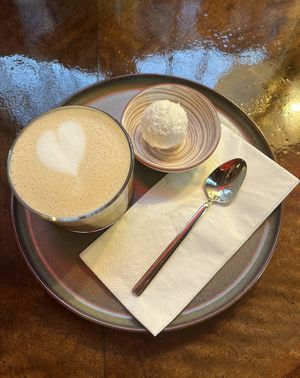 Латте и веган рафаэлка  at Coffee Place in Tbilisi