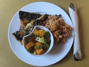 Farinata with vegetables, pasta bolognese and a mix of pumpkin, romanesco cabbage and tofu. at Sale in Zucca in Turin