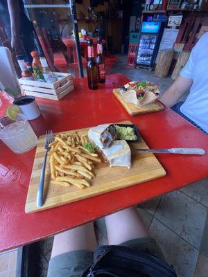Vegan burrito with fries and Aztec (?) salad in eatable bowl  at La Taqueria in Bocas Del Toro