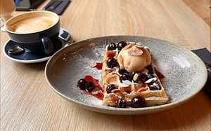 vegan Cherry Bakewell and vanilla latte at Madame Waffle in Lincoln