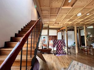 stairs and living room at Yuzaka - Natural & Sustainable Inn in Kazuno