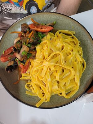 lomo saltado con pasta at Noqa Vegan in Lima