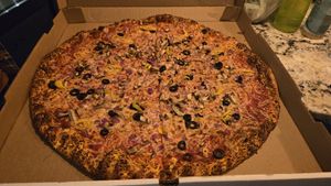 Large vegan pizza whey onion, olives, peperoncino at Smack Daddy in Longmont