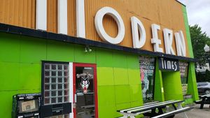 Exterior, June 2021. Has outdoor covered seating around the side. at Modern Times Cafe in Minneapolis