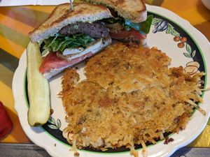 Jonathan Richman with hash browns at Modern Times Cafe in Minneapolis