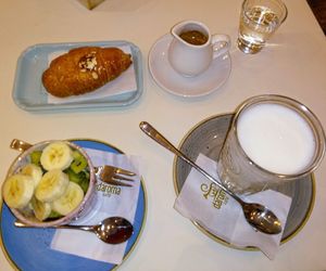 Vegan breakfast : frutta + latte macchiato avena + brioche albicocca at Caffè Letterario in Ravenna