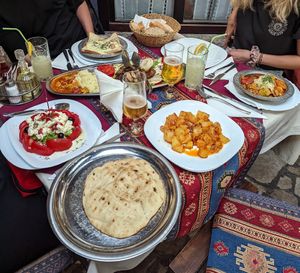 pita, roast potatoes and duvec (all vegan) from left to right, my friends had the veggie plate and other vegetarian sides (in the back) at Sadrvan in Mostar
