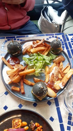 Trio of mini burgers: veggie steak, caramelized onions, cheddar, cervelle de canuts (cheese) at Totem & Tempo Restaurant Bar Tapas in Lyon