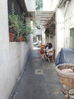 Inner aisle with few tables at VFT Vegan Fried Tofu - temporarily closed in Mexico City