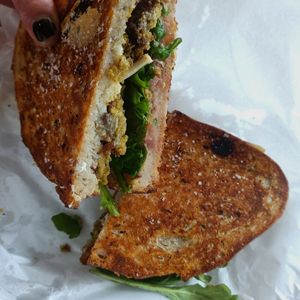 Vegan smashed falafel toastie :)) at Grumbling Goose in Belgrave