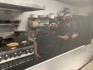Upon entering you pass the kitchen to get to the courtyard dining area   at Limon in Isla Mujeres