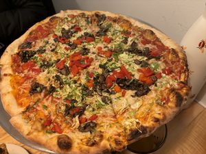 Pizza with vegan cheese, sprouts, broccoli and pepper  at Cushnoc Brewing Co in Augusta