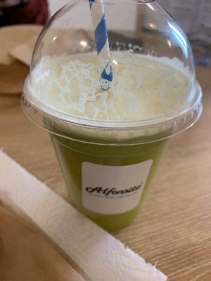 Green juice made fresh - cucumber, apple, celery, lemon, pineapple, kiwi  at Alfonsito in Sevilla