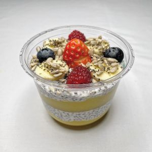 Mango-mania - Fresh mango, ⁣over night chia & coconut milk layers. Topped with fresh raspberries, blueberries, strawberries and banana. Sprinkled with sunflower seeds and even mo at Veganmami - Cloud Kitchen in Manchester