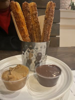 Churros and chocolate with dulce de leche  at Besina in Providence
