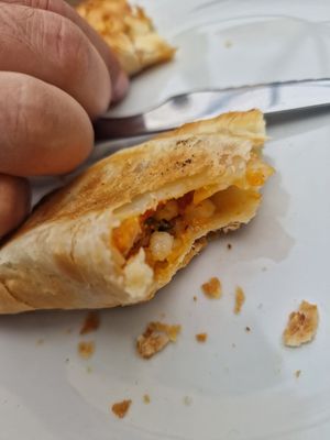 Inside vegan empanada at Pizzería Pipazze in Fuengirola