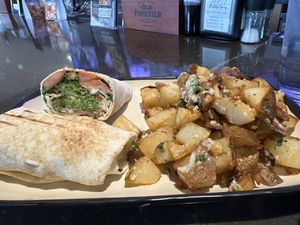 Falafel wrap and garlicky potatoess  at Meddys - Washington Ave in Wichita