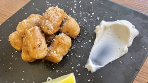 “Chicken” made of bean curd I believe.  Never had anything like it.    at Cofu in Vancouver