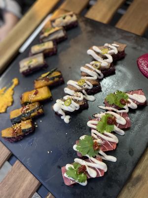 Weekly special (back to front): eggplant, pumpkin, short ribs, tuna.  at Cofu in Vancouver