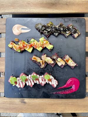 Weekly special (top to bottom): red chard, Mexican, mushroom, tuna.  at Cofu in Vancouver