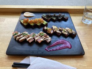 From top to bottom: Red Chard, Mexican, King Oyster Mushroom, and “Tuna.” Sauces are Spicy Mayo and Vivid Beets.  at Cofu in Vancouver