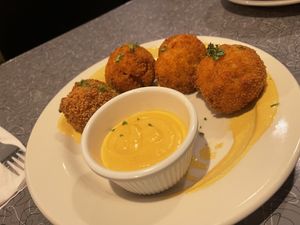 Mac and cheese bites - very plain but really good with the sriracha aioli   at Veggie Galaxy in Cambridge