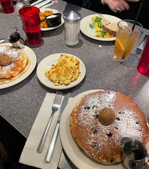 full spread (tofu scramble pictured in middle) and tater tot’s with vegan ranch behind it   at Veggie Galaxy in Cambridge
