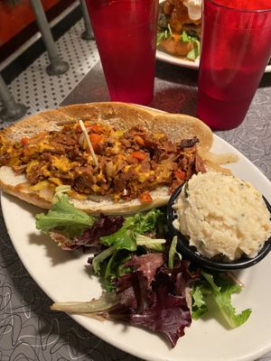 vegan steak and cheese sub with potato salad  at Veggie Galaxy in Cambridge