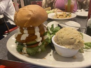 Buffalo chicken sandwich. Partner had it. 3/5. Good texture and enormous, but not a lot of flavor. Potato salad side also a 3/5.  at Veggie Galaxy in Cambridge