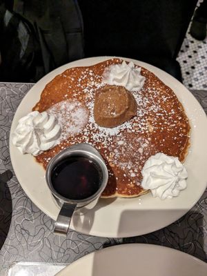 GF short stack chocolate chip pancakes with coco whip and caramelized banana butter at Veggie Galaxy in Cambridge