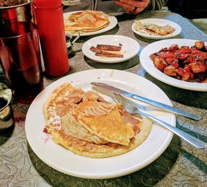 Gluten-free Blueberry Pancake, Home Fries, Bacon, Hash Brown's & Milkshake  at Veggie Galaxy in Cambridge