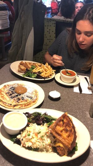 Blueberry pancakes, seitan “chicken” patty on vegan Mac and cheese buns at Veggie Galaxy in Cambridge