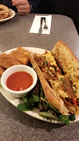 Steak and cheese with vegan mozzarella sticks   at Veggie Galaxy in Cambridge