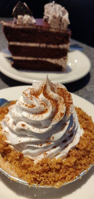 Egg nog cream puff and cookies and cream cake both vegan at Veggie Galaxy in Cambridge