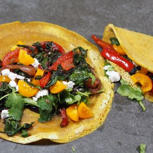 Plantain Flour Tacos with sauteed Swisschard, peppers, mushroom filling topped with chopped tomatoes and vegan feta cheese
Gluten Free, Nut Free, Soy Free at Spoon and Sprout in Houston